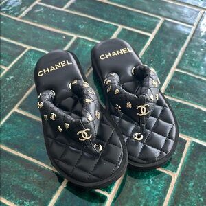 CHANEL Black and Gold Quilted Sandals
